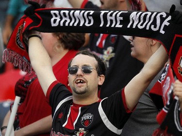 An Ottawa Fury fan shows his support prior to the start of the game.