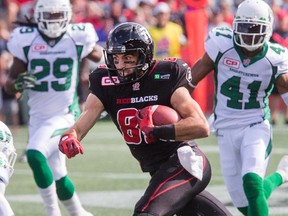 The Redblacks' Brad Sinopoli leaves some Roughriders defenders behind during the first half.