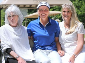 Brooke sits on the back of a golf cart with her mom, Darlene, and her grandma, Marlene Moir. Smiths Fall's golfing phenom Brooke Henderson, 17, and her sister, Brittany, 24, hosted a charity Pro-Am golf tournament Monday at their old club, the Smiths Falls G&CC, in advance of a two-day Canadian women's tour event in June.