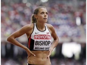 Canada's Melissa Bishop looks at her time from a women's 800m round one heat at the World Athletics Championships at the Bird's Nest stadium in Beijing, Wednesday, Aug. 26, 2015.
