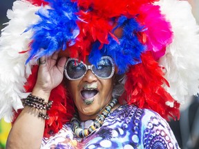 China Doll entertains the crowed prior to the start of the Capital Pride Parade on Sunday, Aug. 23, 2015. Thousands of people took to the streets of downtown Ottawa.