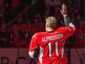 Daniel Alfredsson acknowledges the crowd before he leaves the ice on the day the Ottawa Senators signed him to a one day contract so he could retire as a Senator.