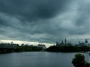 Dark clouds form over the capital's Parliament Hill as a storm rolls into Ottawa last Thursday evening.