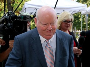 Sen. Mike Duffy arrives at the courthouse in Ottawa on Monday, August 24, 2015.