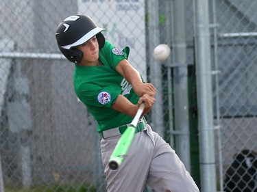 East Nepean Eagles' P #13 Ben Adams hits a homer to the opposite field in the bottom of the second inning.