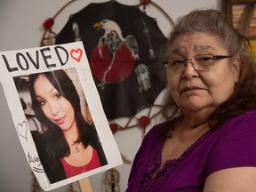 Katie Dene with a photo of her  granddaughter, Shelly Dene, who went missing in August 2013. The family hasn't heard from her since. According to an RCMP report released in May 2014, there are 225 unsolved cases of missing and murdered aboriginal women in Canada.