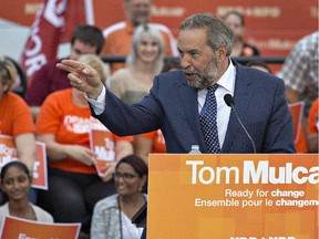 Federal NDP leader Tom Mulcair addresses more than 600 supporters on Thursday at the Civic Centre in Brantford, Ont.