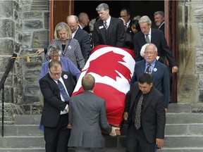 Friends and family of Flora MacDonald carry out her casket after her funeral service at Christ Church Cathedral in Ottawa on Sunday, Aug. 2, 2015.