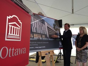 University of Ottawa president Allan Rock and Ottawa-Vanier MPP Madeleine Meilleur unveil a drawing of the university's new $83-million Learning Centre.
