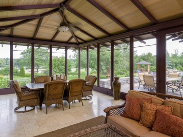 One of the owner’s favourite areas is the sprawling seasonal porch off the kitchen, which overlooks the backyard.