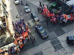 Supporters for party leaders gather outside the debate studio, Aug. 6, 2015.