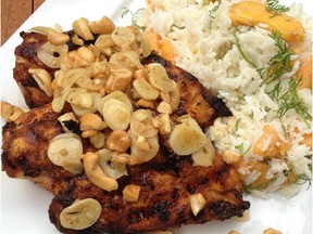 Serve Grilled Chicken Breasts with Cashews and Garlic with basmati rice, perhaps cooked in coconut milk with some cardamom pods thrown in, then garnished with peach slices and cilantro.