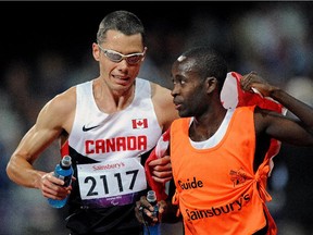 Jason Dunkerley, seen in a file photo with guide Josh Karanja, knew his Brazilian rival would have a 'fire in the belly' for the 1,500 metres after a disqualification in the 5,000.