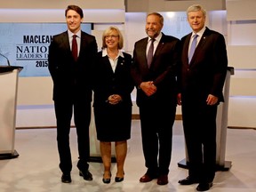 Justin Trudeau, leader of the Liberal Party of Canada; Elizabeth May, leader of the Green Party of Canada; Thomas Mulcair, leader of the New Democratic Party of Canada; and Stephen Harper, leader of the Conservative Party of Canada take part in the Maclean's National Leaders Debate Thursday.