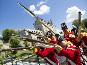 Members of 100th Regiment of Foot performed at the Ottawa Locks on Saturday, Aug. 1, 2015.