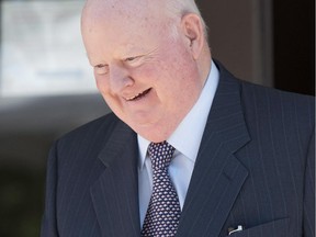 Suspended senator Mike Duffy leaves the courthouse in Ottawa, following the second day of testimony by Nigel Wright, former Chief of Staff to Prime Minister Stephen Harper, on Thursday, Aug. 13, 2015. Duffy is facing 31 charges, including fraud, breach of trust and bribery related to inappropriate Senate expense claims.