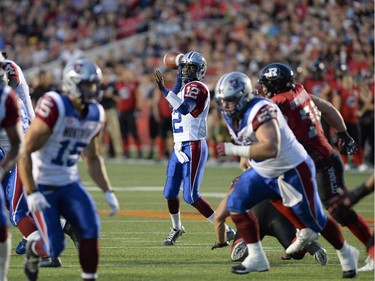 Montreal Alouettes quarterback Rakeem Cato (12) throws the ball against the Ottawa Redblacks.