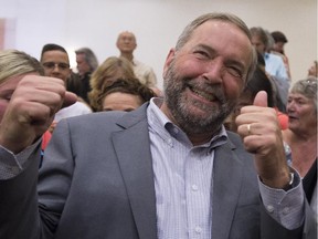 NDP Leader Tom Mulcair attends a campaign rally in Vancouver, Sunday, August 9, 2015.