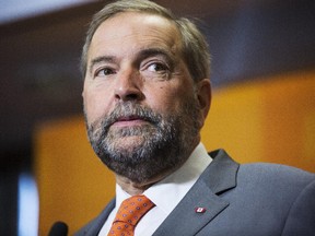 NDP leader Tom Mulcair takes questions from the media during an appearance at a post-debate event in Toronto on Friday, August 7, 2015 as he continues to campaign for the upcoming federal election.