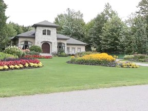 Neighbours have complained that the ditch in front of Rhéal Leroux's Emerald Links home was filled in, contravening an Ottawa bylaw.