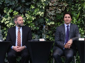Justin Trudeau (R), Liberal Party Leader and Thomas Mulcair, Leader of the NDP took part in the iVote, Youth vote/political engagement event   at the University of Ottawa, March 25, 2014.