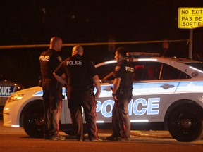 Ottawa police investigate a shooting in Ottawa's south end on Sunday, Aug. 2, 2015.