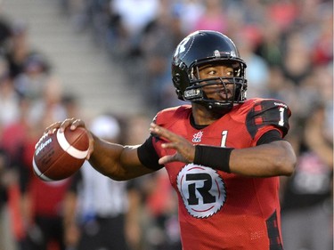 Ottawa Redblacks quarterback Henry Burris looks for a receiver downfield against the Montreal Alouettes.