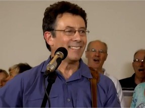 Environment Canada scientist Tony Turner is under investigation after writing and performing an anti-Conservative protest song called Harperman.