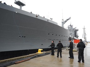 Royal Canadian Navy sailors assist in the docking of the Chilean Navy supply ship Almirante Montt at Canadian Forces Base Esquimalt.