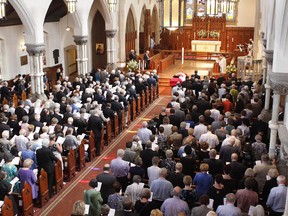 Hundreds of people gather for the funeral of Flora MacDonald held at Christ Church Cathedral in Ottawa on Sunday, Aug. 2, 2015.