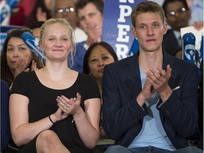 Rachel Harper, left, and brother Ben attend a campaign rally in Ajax, Ont., on Aug. 3.