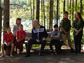 Conservative  leader Stephen Harper meets with members of Scouts Canada as they make a campaign stop on the shores of McIvor Lake  in Campbell River , British Columbia on Friday, August 21, 2015.