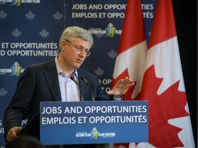 Is he governing or campaigning, wonders Joseph Heath: Amid election-style signage, Stephen Harper makes an announcement in 2014.