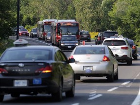 Taxis slow traffic to a crawl Monday north- and southbound along the Airport Parkway.