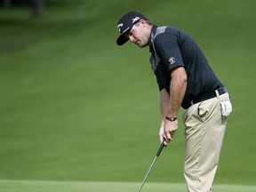Taylor Pendrith from Richmond Hill, Ont., putts on the 16th green at the Hylands Golf Club on Friday, Aug. 21, 2015. He is tied for second after two rounds of the Mackenzie Tour-PGA Tour Canada National Capital Open to Support Our Troops.