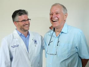Dr. Adam Sachs (left), a neurosurgeon at The Ottawa Hospital and Asst. Professor at the University of Ottawa's Brain and Mind Research Institute, is the first doctor in Ottawa to perform deep brain stimulation to help control the tremors of Parkinson's.  One of his patients, Dr. Jacques Theriault, 70,  was diagnosed with the disease eight years ago and shook uncontrollably until his surgery last fall. Today, Theriault has no visible tremors.