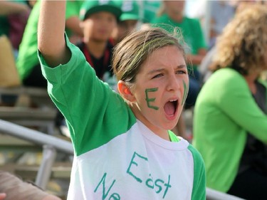 Tyra Pileggi, age 10, cheers the host East Nepean Eagles players.