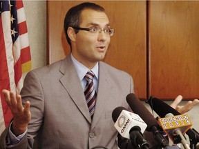 Benjamin Perrin speaks to the media in 2009 after being honoured at the U.S. Consulate in Vancouver for his work  fighting human trafficking.