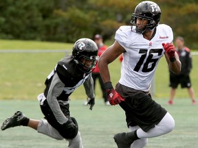 Wide receiver Marcus Henry (white jersey) led the Redblacks last year with 67 receptions for 824 yards.