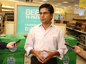 Yasir Naqvi, MPP for Ottawa Centre, shown announcing that the LCBO will sell 12 packs of beer at the Barrhaven location as a a pilot program.