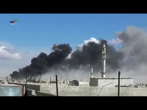 In this image made from video provided by Homs Media Centre, which has been verified and is consistent with other AP reporting, smoke rises after airstrikes by military jets in Talbiseh of the Homs province, western Syria, Wednesday, Sept. 30, 2015. Russian military jets carried out airstrikes in Syria for the first time on Wednesday, targeting what Moscow said were Islamic State positions. U.S. officials and others cast doubt on that claim, saying the Russians appeared to be attacking opposition groups fighting Syrian government forces. (Homs Media Centre via AP)