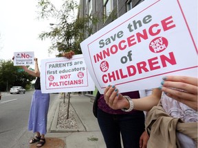A dozen attended the anti-sex ed protest in front of Yasir Naqvi's office in Ottawa, Sept. 02, 2015.