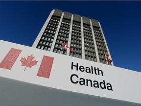 A sign is displayed in front of Health Canada headquarters in Ottawa.