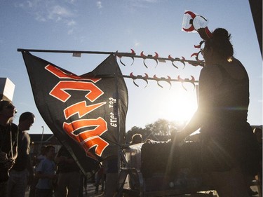 A woman sells devil horns before the AC/DC concert.