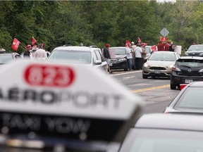 Ottawa taxi drivers at an earlier protest on the Airport Parkway.