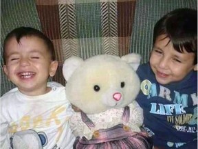 Alan, left, and his brother, Ghalib Kurdi, are seen in an undated family handout photo courtesy of their aunt, Tima Kurdi. Alan, Ghalib, and their mother Rehanna died as they tried to reach Europe from Syria.