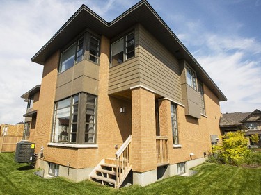 The rear of the brick townhomes are as detailed and interesting as the fronts.