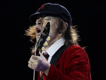 Angus Young, lead guitarist of AC/DC, the thunder from down under.