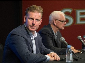 Daniel Alfredsson and GM Bryan Murray .