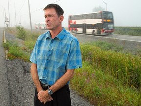 David Gibson at the place his life changed: The scene of the bus-train crash in Barrhaven in September 2013.  Wayne Cuddington/ Ottawa Citizen